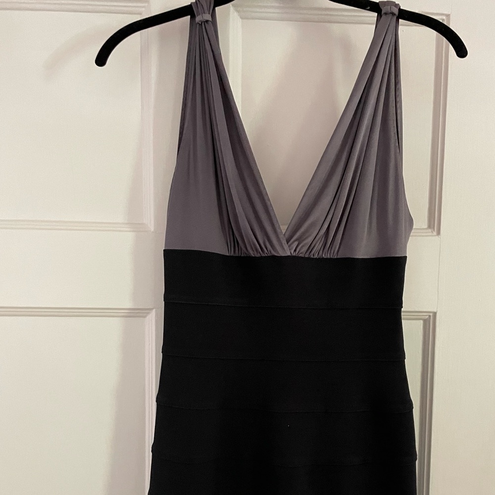 Spandex and silk dress. Very form fittting